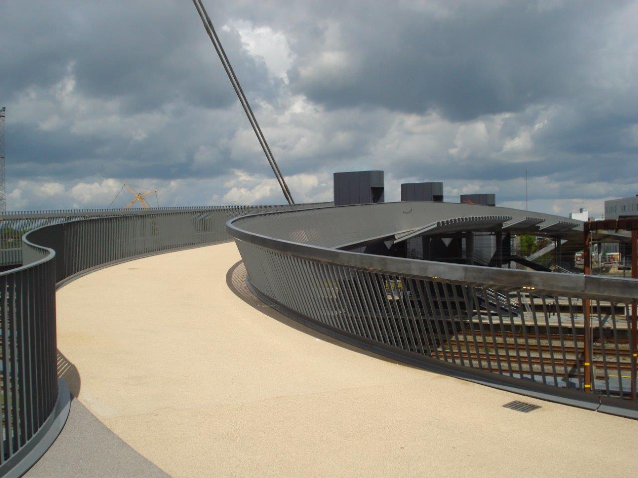 Byens Bro walkway and metal railing; the whole bridge is not attributed to AKS.