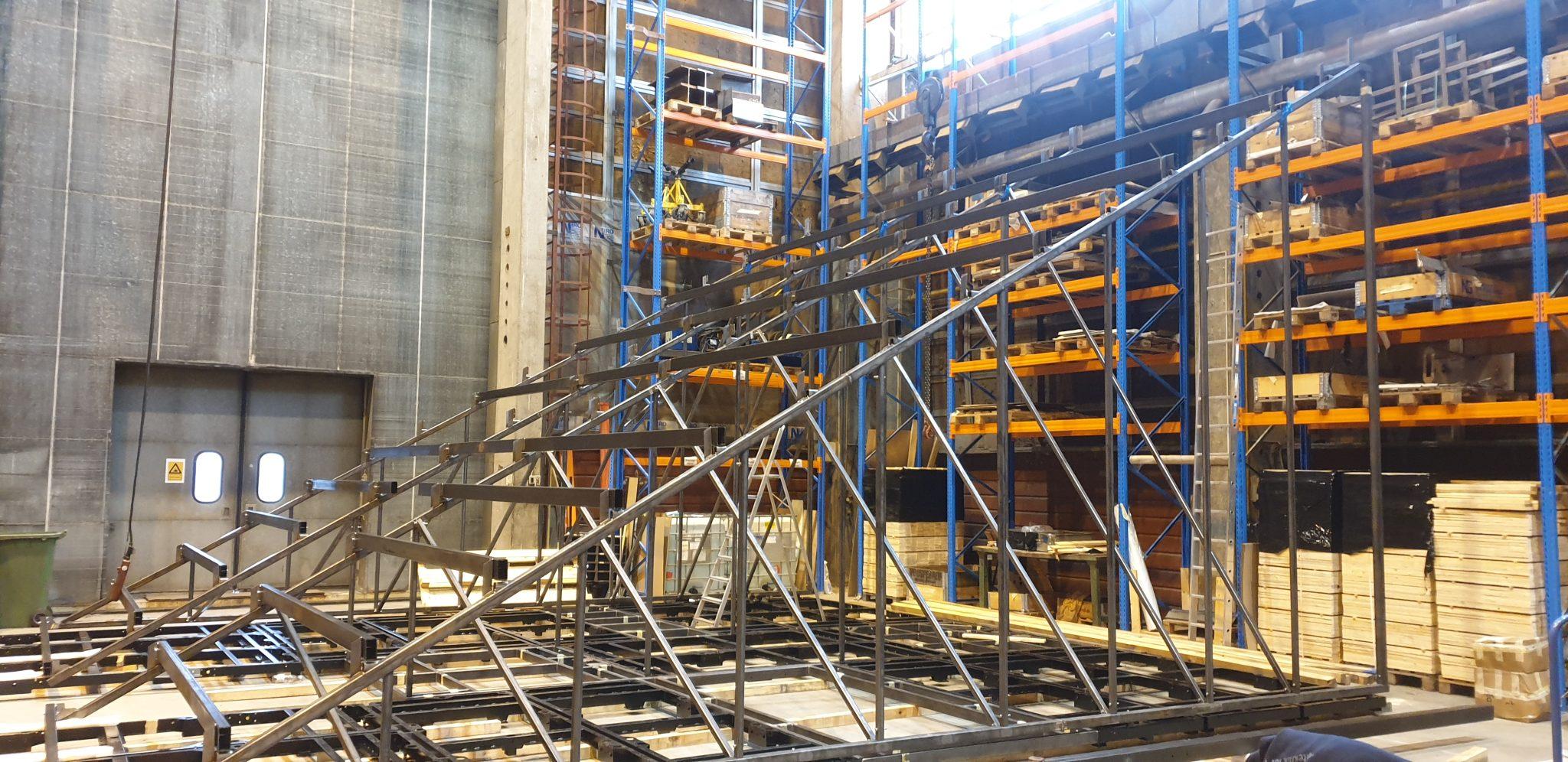 Valkyrien staircase support structure in workshop assembly.